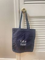 Front view showing GiGi Tommy Hilfiger Hadid logo, full bag form