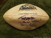 Football showing Super Bowl XL logo, limited edition of 10,000, and signature with dedication.