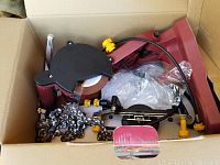 Electric chain saw opener with chain and accessories packed in a box