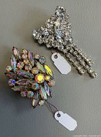 Both brooches overview