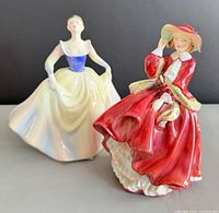 Front view of both Royal Doulton figurines