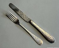 Spreader knife and fork showing full design
