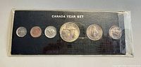 Front view of six-coin Canadian Year Set in original holder
