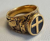 Ring angled view showing cross face and band detail