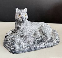Front view of Wolf Original figurine showing adult dog and pup detail