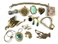 Overview of all jewelry pieces arranged on white background