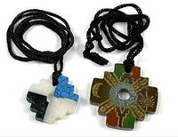 Both Peruvian Chakana cross pendants on cords