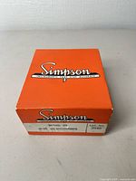 Orange Simpson box showing branding