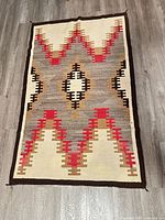 Full view of rug oriented vertically showing entire pattern