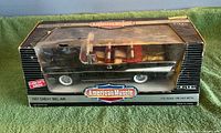 Front of boxed 1957 Chevy Bel Air model showing vehicle and packaging
