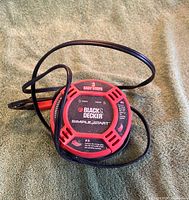 Front view of Black & Decker Simple Start unit with cord