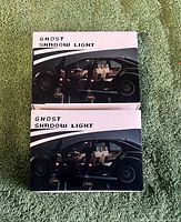 Front view of two identical Ghost Shadow Light boxes