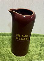 Front view showing Chivas Regal logo and spout