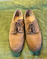 Top view of both shoes showing uppers, laces, and overall wear