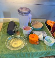 Group shot of all 12 kitchen items on towel