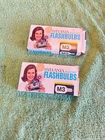 Front view of two Sylvania Blue Dot flashbulb boxes