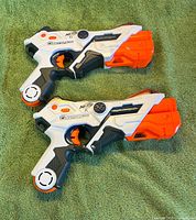 Both Nerf Laser Ops Pro Alphapoint blasters side by side