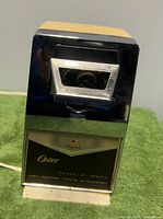 Front view showing Oster branding and blade assembly