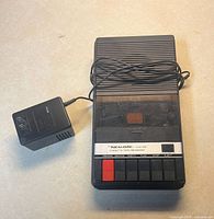 Front view of Realistic CTR-55 recorder with AC adapter