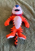 Front view of Tony the Tiger plush showing overall design and condition