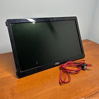 Front view of monitor with cable coiled