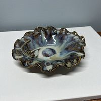 Top view showing ruffled rim and glaze pattern