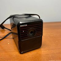 Front view showing sharpening port and Boston branding