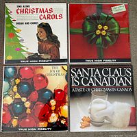 Front view of all four sealed LP jackets