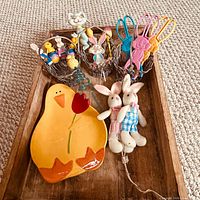 Full lot on wooden tray showing plate, baskets, tongs and picks