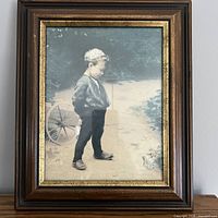 Full view of framed print showing image and frame design