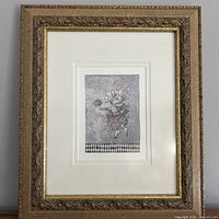 Full view of framed art showing frame, mat and print