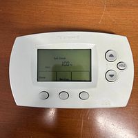 Front view showing screen, buttons, Honeywell branding