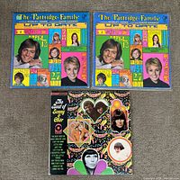 Front covers of all three LPs