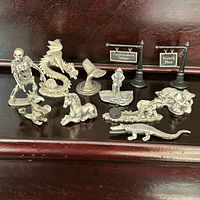Overview of all eleven pewter figurines