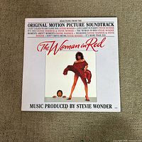 Front cover of The Woman in Red soundtrack LP