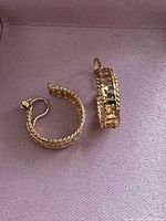 Pair of textured yellow gold hoop earrings on box