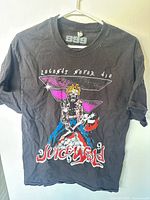 Front view of black Juice WRLD Legends Never Die graphic T-shirt on hanger