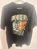 Front view showing RIP EPSTEIN graphic design