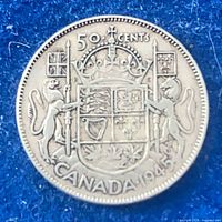 Reverse side with Canadian coat of arms and 1945 date