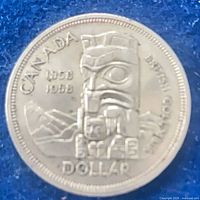 Reverse of 1958 British Columbia Totem Pole silver dollar