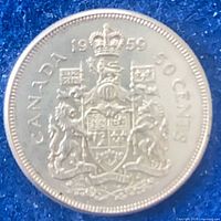 Reverse showing 1959 date, CANADA legend, 50 CENTS denomination, Coat of Arms