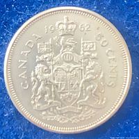 Reverse of 1962 Canadian 50-cent coin showing coat of arms