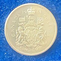 Reverse displaying Canadian coat of arms with CANADA 1964 50 CENTS legend