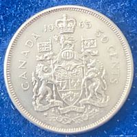 Reverse side showing Canadian coat of arms and date 1965