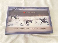 Outer sleeve showing Specimen Set 2004 with flying geese imagery