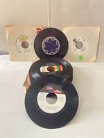 Front view showing stack of 7-inch singles, some in sleeves