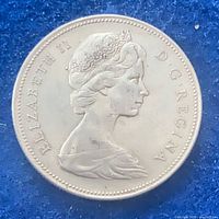Obverse of 1966 Canadian silver dollar showing Queen Elizabeth II portrait