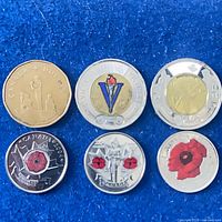 Group shot of all six commemorative coins