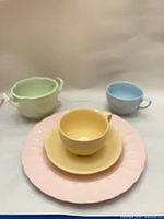 Group shot of all five pastel dinnerware pieces