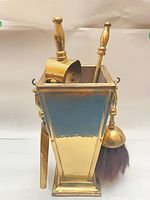 complete fireplace tool set in holder side view